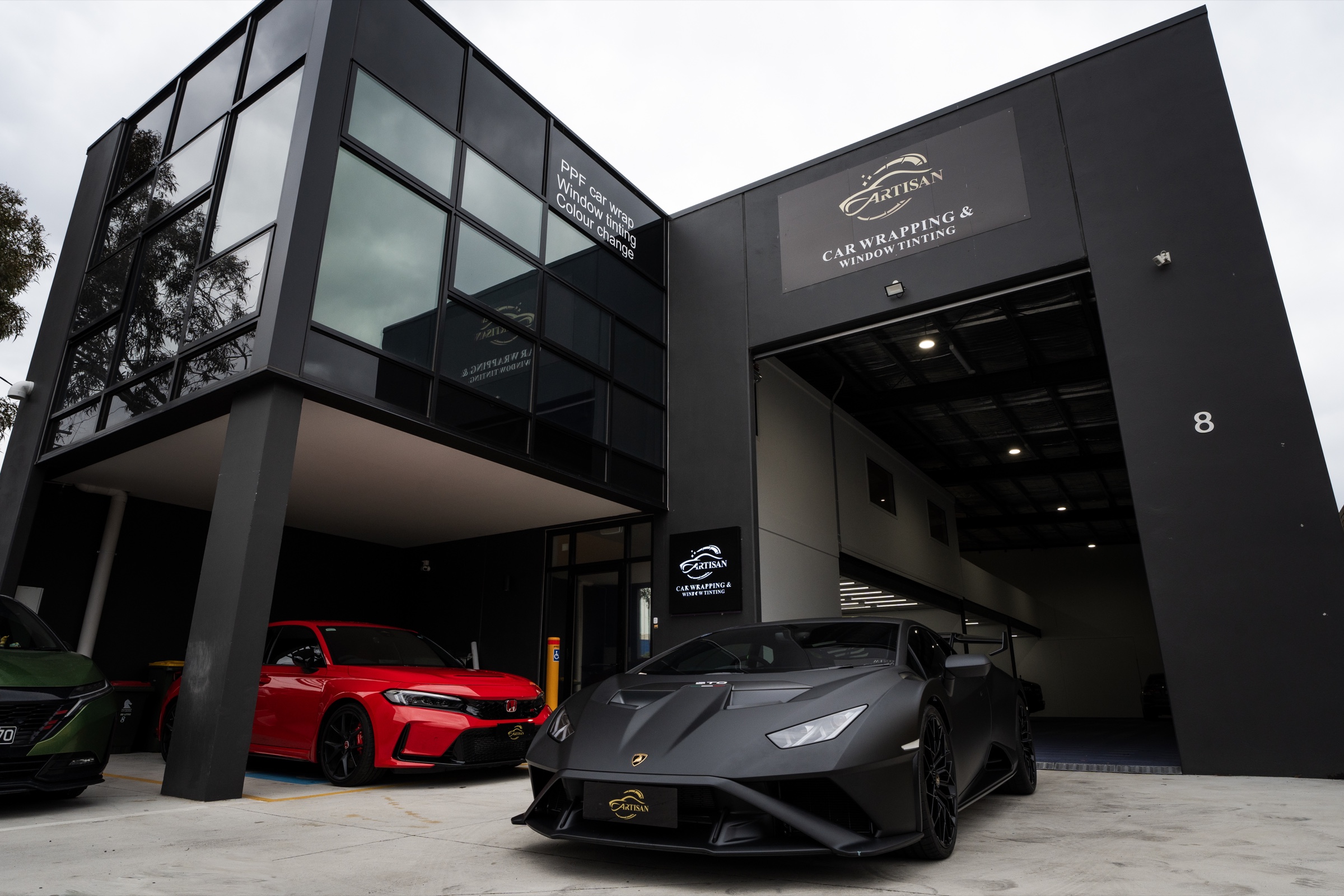 New vehicles prepared inside the Artisan Blackburn installation studio